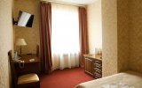 Room with a large double bed Standard superior